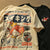 Vintage Japan Kanji Cartoon Fun Graphic T Shirts Kawaii Clothes Streetwear Oversized Khaki Tops 2022 Summer Large 2XL Harajuku